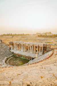 Roman amphitheater in the ruins of hierapolis, in pamukkale, turkey. unesco world heritage in turkey