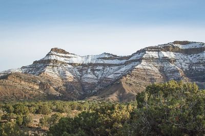 Scenic view of rocky mountains against sky