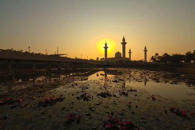 View of mosque at sunset