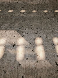 Close-up of shadow on sand