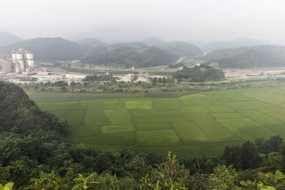 Scenic view of mountains and cityscape