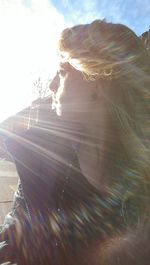 Sun shining through clouds