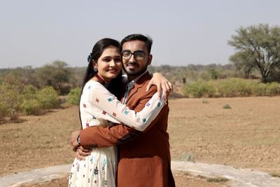 Portrait of a smiling young couple