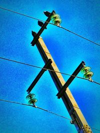 Low angle view of building against blue sky