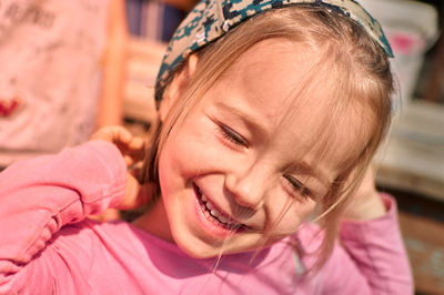 Close-up portrait of a smiling girl