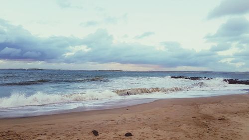 Scenic view of beach against sky