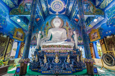 Low angle view of statue in temple building