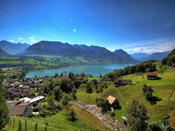 High angle view of building and mountains against sky
