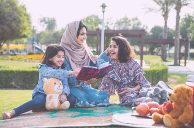 Group of people sitting outdoors