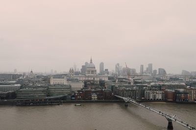 Buildings in city against sky