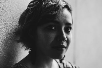 Close-up of young woman looking away