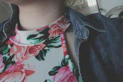 Close-up of woman wearing floral top and jacket