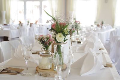 White flowers in vase on table