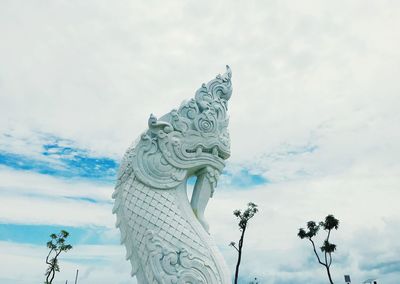 Low angle view of statue against sky