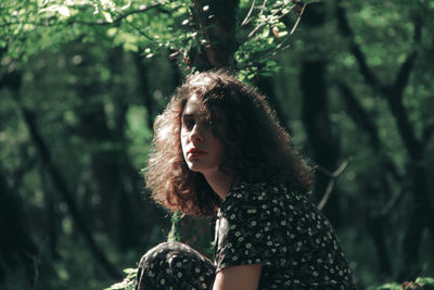 Portrait of woman in forest