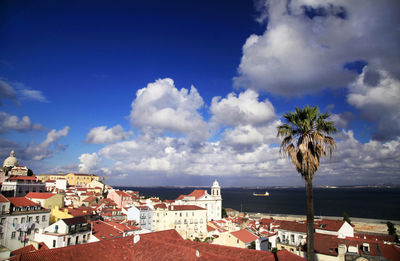 Panoramic view of town against sky