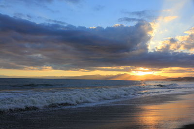 Scenic view of sea against sky during sunset