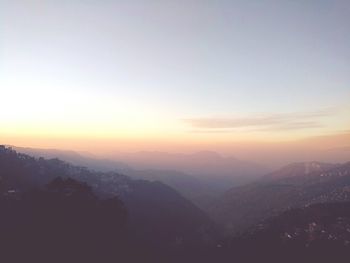 Scenic view of landscape against sky during sunset