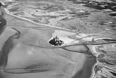 High angle view of ice on beach