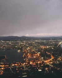 High angle view of illuminated buildings at night