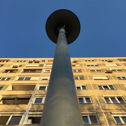 Low angle view of skyscraper against clear sky