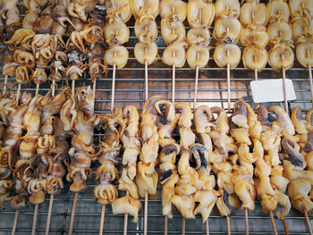 High angle view of fresh raw squids street food ready to grill