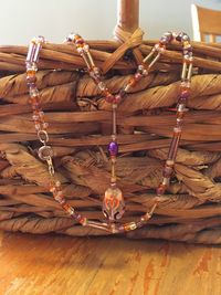 Close-up of rope tied on wood