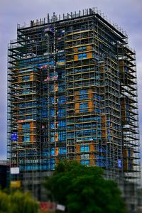 Low angle view of building against blue sky