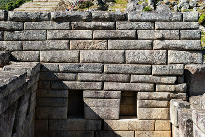 A wall with fitting stones in machu picchu