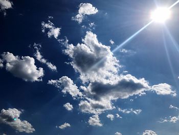 Low angle view of blue sky and clouds