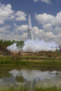 Rocket launch on landscape