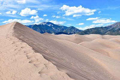 Scenic view of great sand dunes national park and preserve against sky