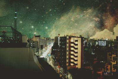 Illuminated buildings in city at night