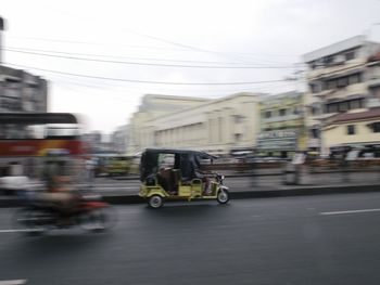 Cars on street in city