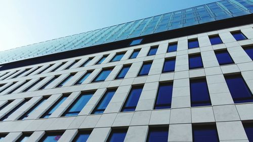 Low angle view of modern building against clear sky