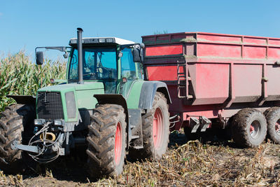 Tractor on field against sky