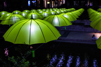 Green illuminated lights in city at night