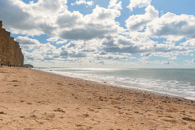 Scenic view of beach against sky