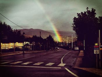 Road in city against sky