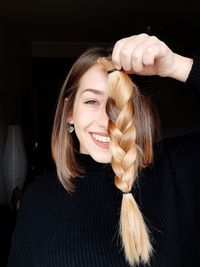 Portrait of a smiling young woman