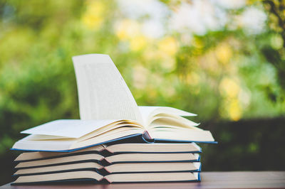 Stack of books on table at home