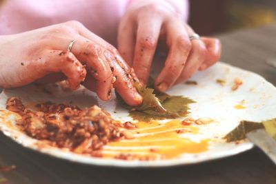 Close-up of person preparing food