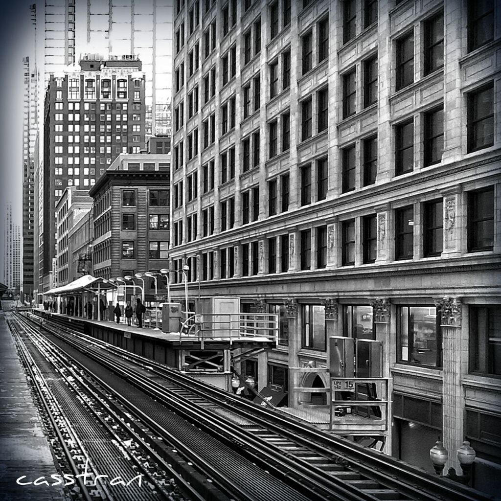 architecture, building exterior, built structure, railroad track, transportation, city, rail transportation, public transportation, building, city life, high angle view, mode of transport, railroad station, railroad station platform, window, incidental people, outdoors, day, no people, street