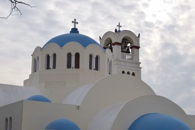 Low angle view of white building against sky