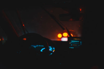 Traffic lights in car at night