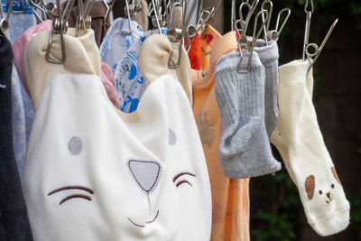 Close-up of clothes hanging on clothesline