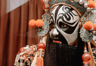 Close-up of man in costume during traditional festival