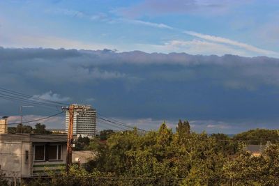 View of built structures against mountain range