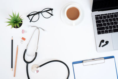 High angle view of coffee cup on table