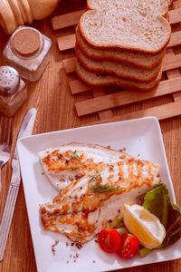 High angle view of breakfast served on table